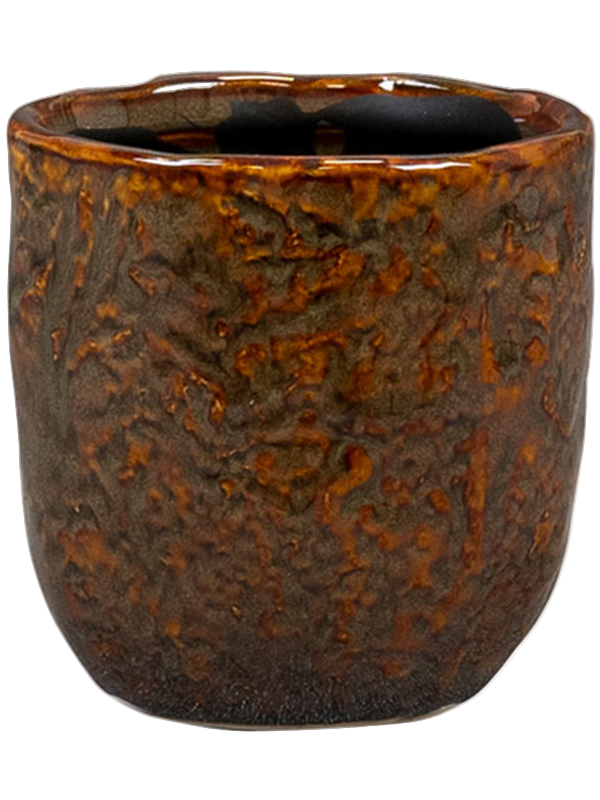 Brown ceramic cup with textured surface on a white background