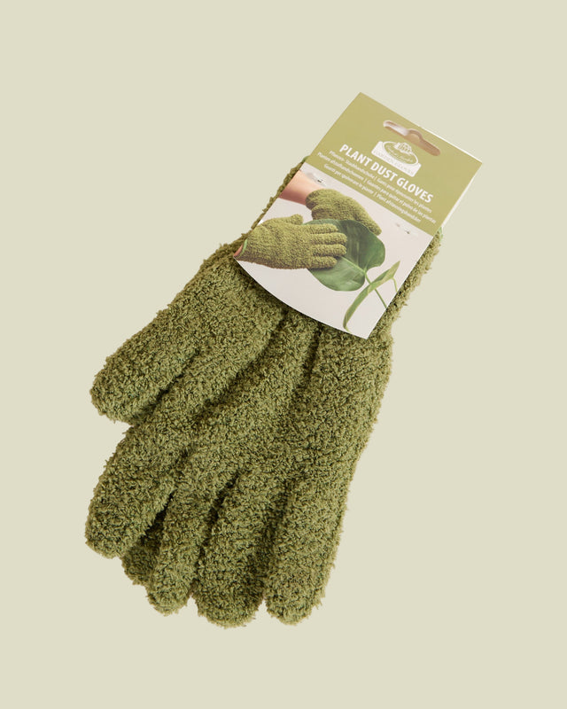 microfiber green leaf care gloves on a beige background